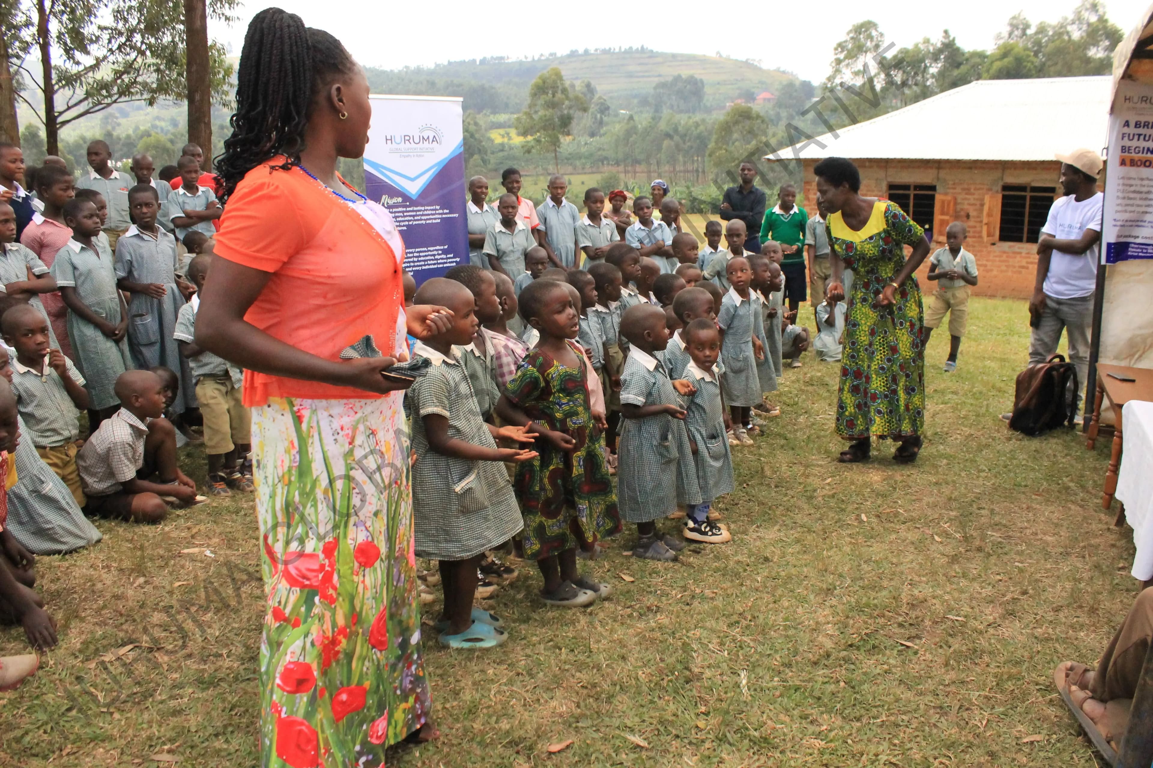 Children and parents gathered at a Huruma school outreach in Uganda